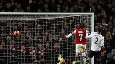 Centre midfield: Tomas Rosicky, Arsenal. Ran from the half-way line to score and decide the North London derby. Adrian Dennis / AFP
