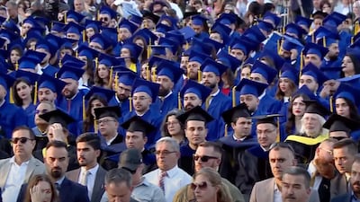 Graduates attend the commencement ceremony at the American University of Iraq. Photo: Screengrab