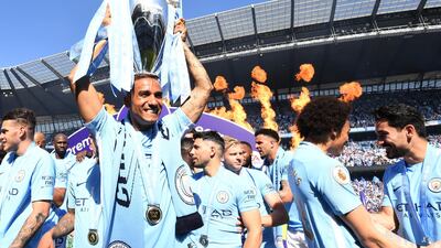 Danilo of Manchester City celebrates with The Premier League Trophy after the Premier League match between Manchester City and Huddersfield Town at Etihad Stadium in Manchester, England, on May 6, 2018. Michael Regan / Getty Images