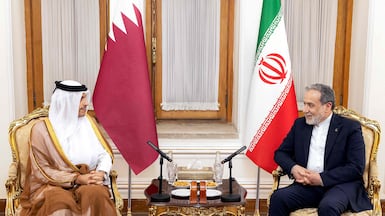 Qatar's Prime Minister Sheikh Mohammed bin Abdulrahman with Iran's Foreign Minister Abbas Araghchi in Tehran. AFP