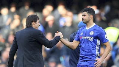 Diego Costa, right, with Chelsea manager Antonio Conte, is anxious to leave the Premier League club. Clive Rose / Getty Images