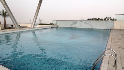 Pooja Singh says she loves the swimming pool in her building. Pawan Singh / The National