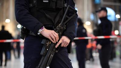 The man was arrested by at the station after police opened fire and wounded him. AFP