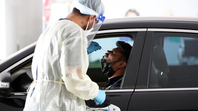 Dubai Health Authority has opened three new drive-through PCR testing centres and a Covid-19 screening hall. Pawan Singh / The National