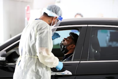 Travellers arriving in Abu Dhabi from any country must take follow-up PCR tests. Pawan Singh / The National