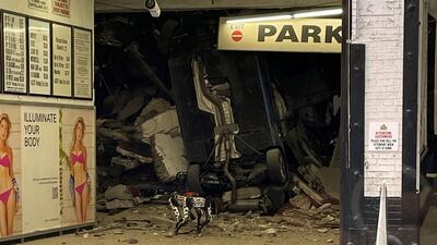 A car between rubble. AFP