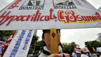 Anti-G8 activists take part in a demonstration in Sapporo ahead of the Hokkaido Toyako G8 Summit. Leaders of the eight major powers are reportedly set to agree on a new system of "food reserves" to assist hungry nations.