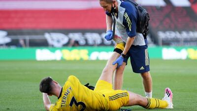 Kieran Tierney - 7: Blow for Arsenal. Looked impressive until he was forced off in second half in a debut season already ravaged by injury. Reuters