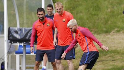 Barcelona’s Lionel Messi and Jeremy Mathieu during a team training session at St George’s Park near Burton-on-Trent, central England, on July 27, 2016. Darren Staples / Reuters