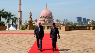 Turkish President Recep Tayyip Erdogan, left, and Malaysian Prime Minister Anwar Ibrahim in Putrajaya, Malaysia. AP