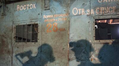 Ukrainian miners stand at a lift in the Kalinin mine in eastern Ukraine city of Horlivka. In the first quarter, Ukraine produced 5.99 million metric tonnes of coking coal, which is used in steel making, down 4.2 per cent from 6.25 million metric tonnes during the same period of 2013. Evgeniy Maloletka / AP Photo
