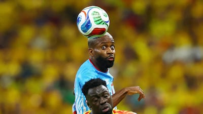 DR Congo's Cedric Bakambu in action with Colombia's Davinson Sanchez, in Guadalajara. Reuters