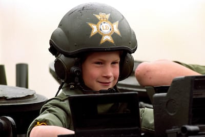 Prince Harry in 1993 during a visit to the barracks of the British army's Light Dragoons unit in Hanover, Germany. PA
