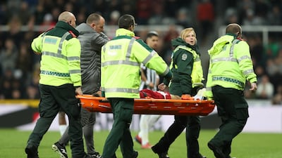 Salah is stretchered off of the pitch after sustaining an injury. Scott Heppell / Reuters