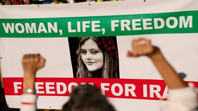 Demonstrators chant slogans while marching during the "March of Solidarity for Iran" in Washington, DC. AFP
