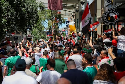 Iraq fans arrive before the match in Boston. Getty Images via AFP