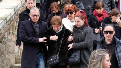 Mourners leave the service of remembrance at the Saint Etienne Church in Trebes in southwest France, two days after a man carried out an attack in which four people were killed. Eric Cabanis/ AFP Photo