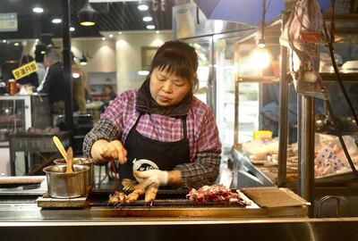 A kebab seller at the night market in the Muslim quarter of Xian. Courtesy James Langton