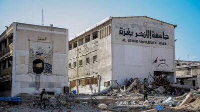 The heavily damaged buildings of Al Azhar University in Gaza city. More academics are fleeing persecution and conflict than ever, a British NGO says. AFP