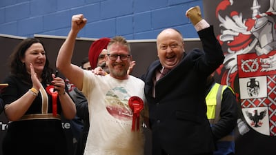 Stephen Blakemore and Adrian Knapper of Labour celebrate after wining Birches Head and Northwood in Stoke-on-Trent. Getty Images
