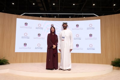 Abdulla bin Touq, Minister of Economy and Tourism and Reem Al Hashimy, Minister of State for International Co-operation and chief executive of Expo City Dubai Authority, launch the UAE's first green innovation district at Expo City Dubai. Chris Whiteoak / The National