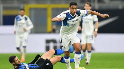 Atalanta's Luis Muriel in action with Inter Milan's Roberto Gagliardini. Reuters