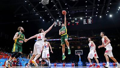 Lithuania's Mantas Kalnietis attempts a shot against Spain on Sunday in the EuroBasket 2015 final. Yoan Valat / EPA