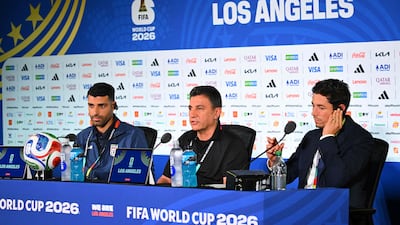 Iran's head coach Amir Ghalenoei, centre, gives a press conference next to Iran forward Mehdi Taremi, left, at Los Angeles Stadium in Inglewood. AFP