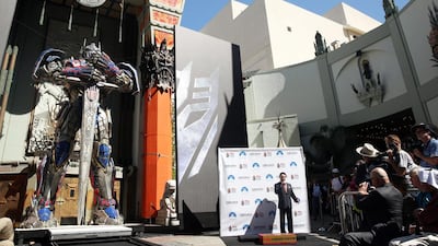 Actor Peter Cullen, who has voiced OPTIMUS PRIME for three decades, speaks about his inspiration for the valiant AUTOBOT leader during the world-famous handprint-footprint ceremony at the TCL Chinese Theatre IMAX on Tuesday, September 30, 2014. AP