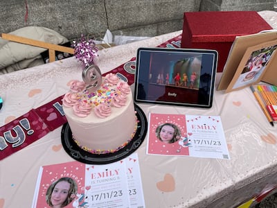 A birthday cake on a table at the entrance to St Stephen's Green in Dublin for Irish-Israeli girl Emily Hand. PA