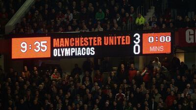 A view of the scoreboard in the east stand inside Old Trafford at the final whistle of Wednesday night's Manchester United v Olympiakos match. Peter Powell / EPA / March 19, 2014