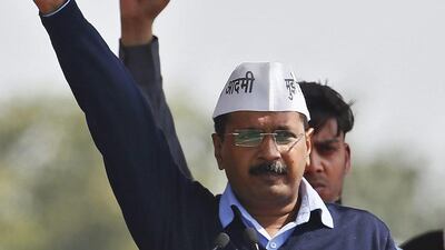 Arvind Kejriwal shouts slogans after taking the oath as the new chief minister of Delhi during a swearing-in ceremony at Ramlila ground in New Delhi. Anindito Mukherjee / Reuters