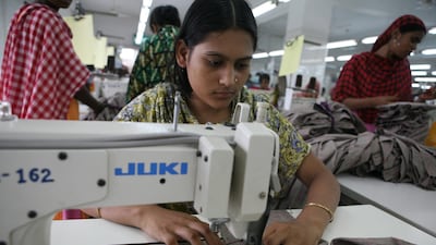Workers sew clothing for a fast fashion retailer in Bangladesh. Nicole Hill/The National)