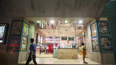 The entrance of the Eldorado cinema. Before the shift to Malayalam and Tamil-language films, the cinema showed the latest releases, such as Titanic and Saving Private Ryan. Mona Al Marzooqi / The National