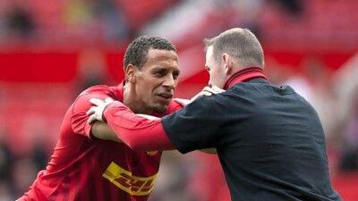 The columnist feels that Rio Ferdinand, left, remains a team player despite failing to observe orders in an anti-racism campaign.