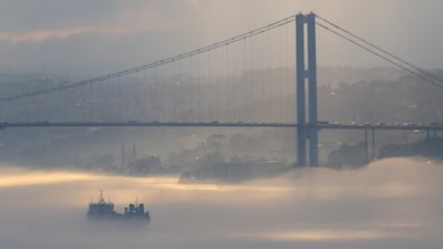 A ship navigates the Bosphorus strait amid heavy fog in Istanbul, Turkey. Getty Images