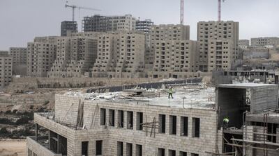Rawabi on the West Bank, between Ramallah and Nablus, is a 10,000-home Palestinian city under construction since 2010. Oliver Weiken / EPA