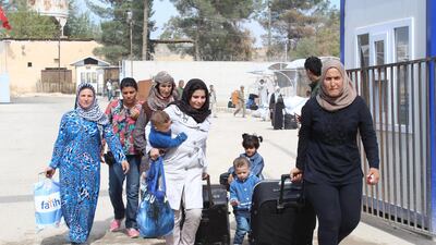 Many families cannot afford to pay for transport across the Turkish-Syrian border so they make the journey on foot. Florian Neuhof for The National