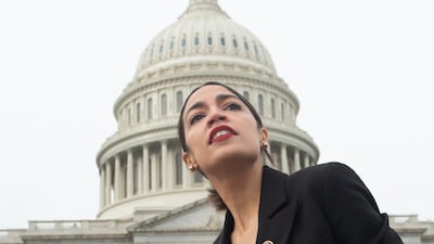 US Representative Alexandria Ocasio-Cortez, Democrat of New York, leaves a photo opportunity with the female Democratic members of the 116th US House of Representatives
