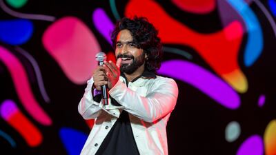 Menon reacts to the crowd.