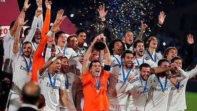 Real Madrid's captain Iker Casillas, centre, lifts the trophy as his teammates celebrate after their victory in the final final match of the Fifa Club World Cup 2014 between San Lorenzo of Argentina and Real Madrid of Spain, in Marrakech, Morocco, 20 December 2014. EPA/MOHAMED MESSARA