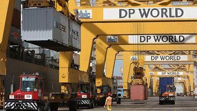 Cranes load containers at Jebel Ali port in Dubai. PMI results signal that the economy is managing to avoid a cooling off across other emerging markets. Pawan Singh / The National