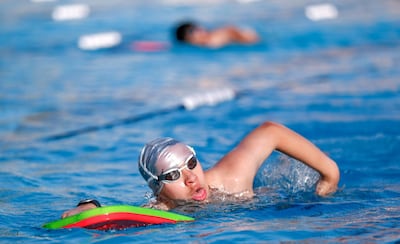 The UAE Special Olympic swimming team trains in Al Ain ahead of the regional games on Wednesday. Victor Besa / The National