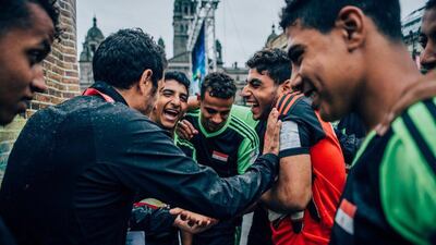 Coach Mohamed Abou Hussein, one of the co-founders of Nafas social enterprise that organises various street football leagues and training sessions, with players at the 2015 Street Child World Cup in Scotland. Photo: Nafas
