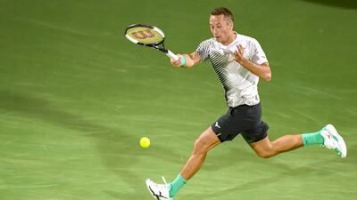 Germany's Philipp Kohlschreiber returns to Serbia's Novak Djokovic during the Dubai Duty Free Tennis Championships. AFP