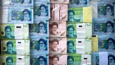 Iranian rial banknotes on display at a currency exchange in Tehran, Iran. The currency has plunged more than 70% in the wake of tougher US sanctions by the outgoing administration of former president Donald Trump. Getty Images