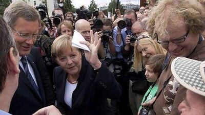 Issuing common euro-zone debt is more politically risky for the German chancellor Angela Merkel than any of the bailout packages she has signed up to. Markus Schreiber / AP Photo