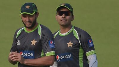 Shahid Afridi and Umar Akmal shown on Tuesday at Gaddafi Cricket Stadium in Lahore ahead of their series with Zimbabwe. Aamir Qureshi / AFP / May 19, 2015