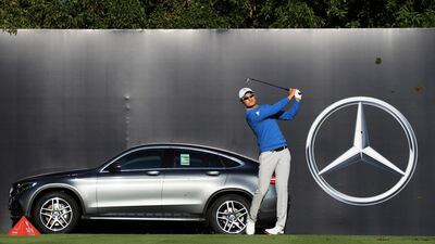 Li Haotong of China plays his shot from the 12th tee. Matthew Lewis / Getty Images