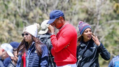 Tiger Woods plays a shot on the 5th green during the first round of the Presidents Cup at the Royal Melbourne Golf Club. EPA